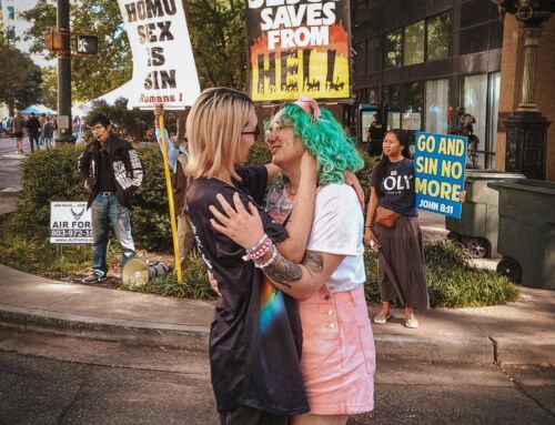 Lesbian Couple Kiss in Front Of ‘Hate Preachers’